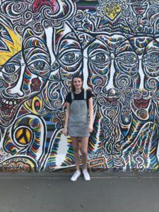Bella in front of the Berlin Wall